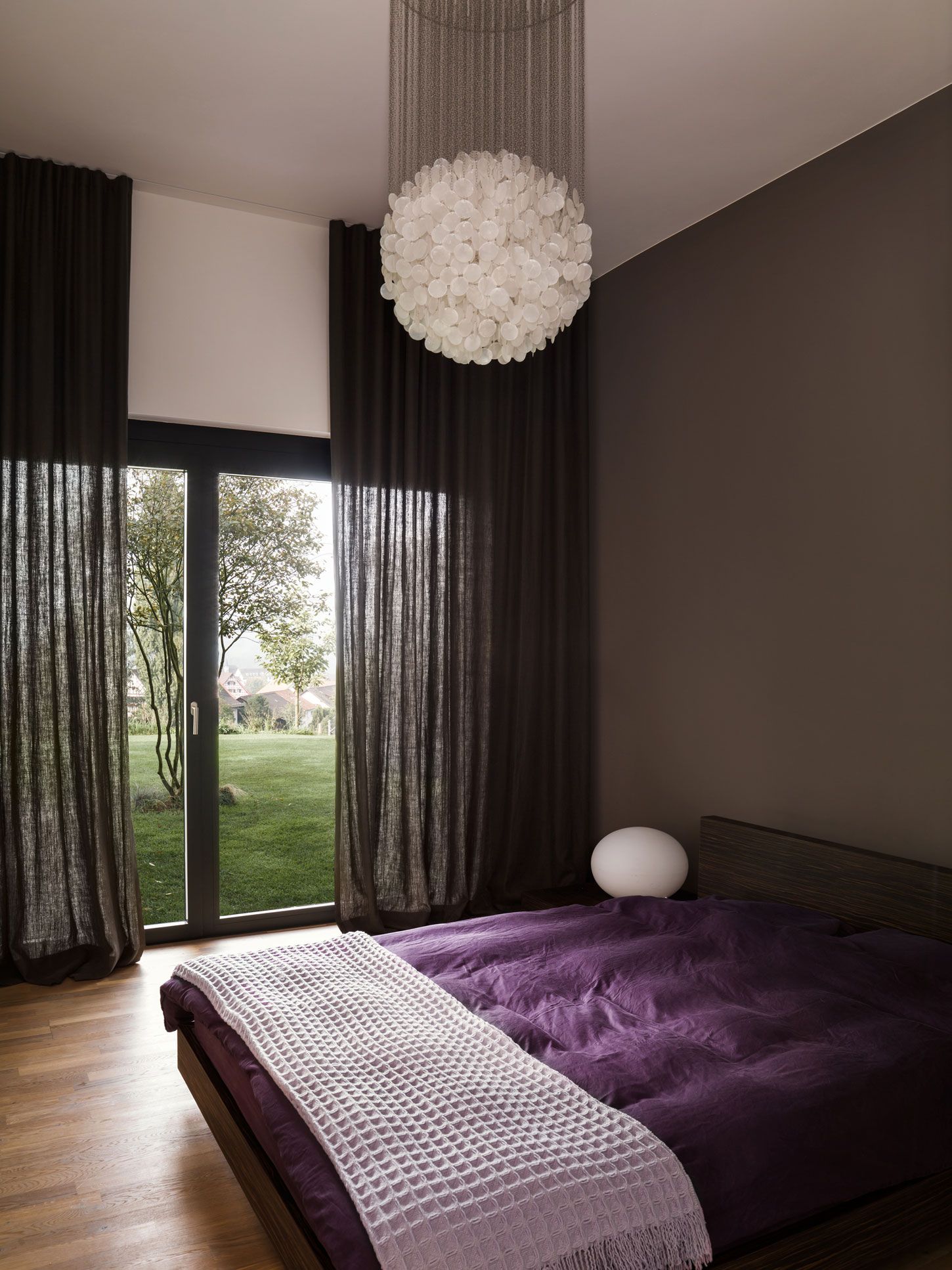 A Bright Modern Home with White Facade and Large Glass Windows in Uitikon, Switzerland by Meier Architekten (16)