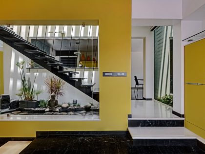 A Bright and Warm Modern Home with Lots of Yellow and White in Nagarbhavi, India by Ashwin Architects (10)