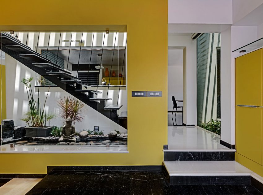 A Bright and Warm Modern Home with Lots of Yellow and White in Nagarbhavi, India by Ashwin Architects (10)