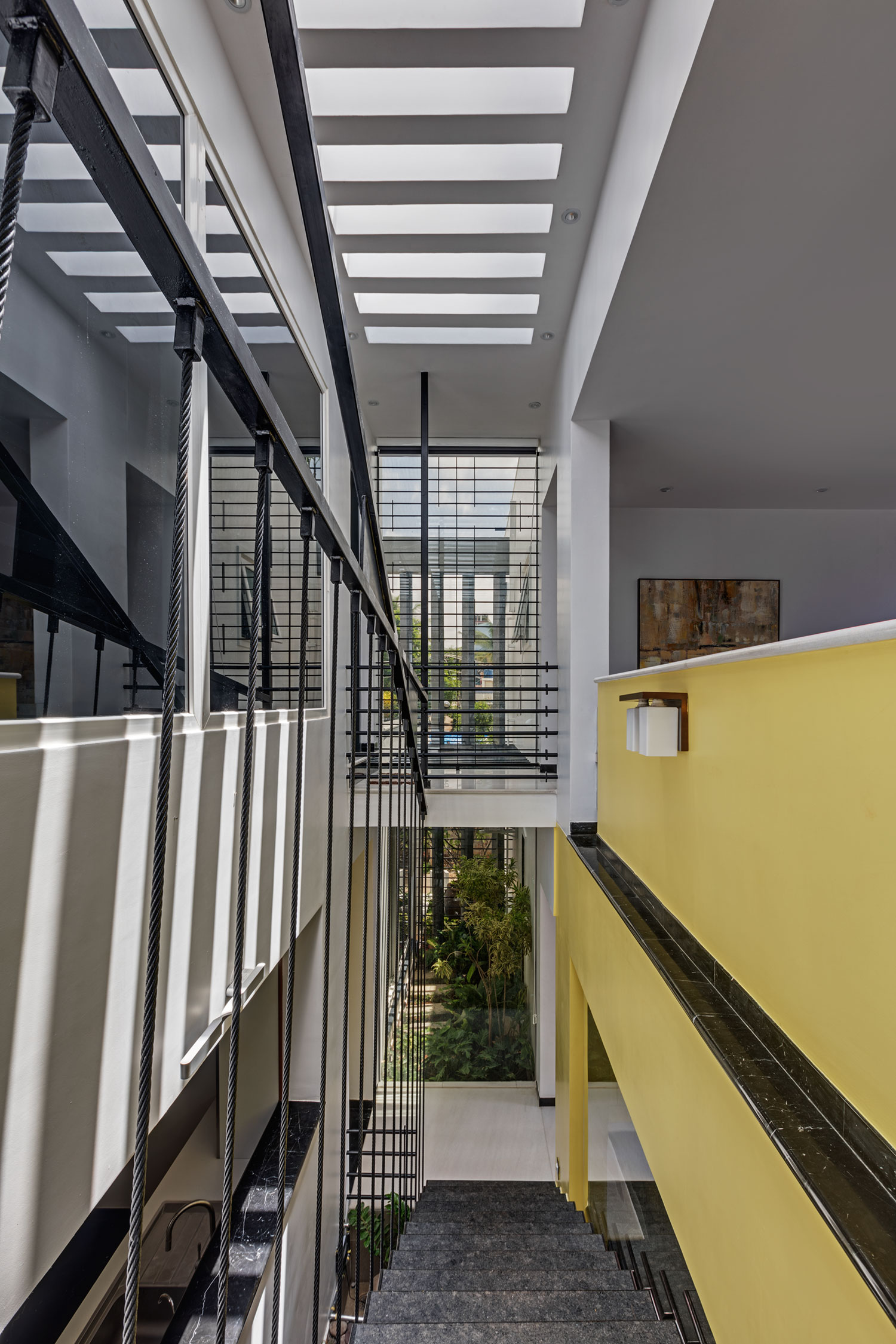 A Bright and Warm Modern Home with Lots of Yellow and White in Nagarbhavi, India by Ashwin Architects (12)