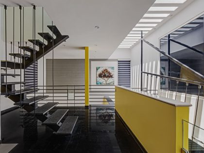 A Bright and Warm Modern Home with Lots of Yellow and White in Nagarbhavi, India by Ashwin Architects (13)