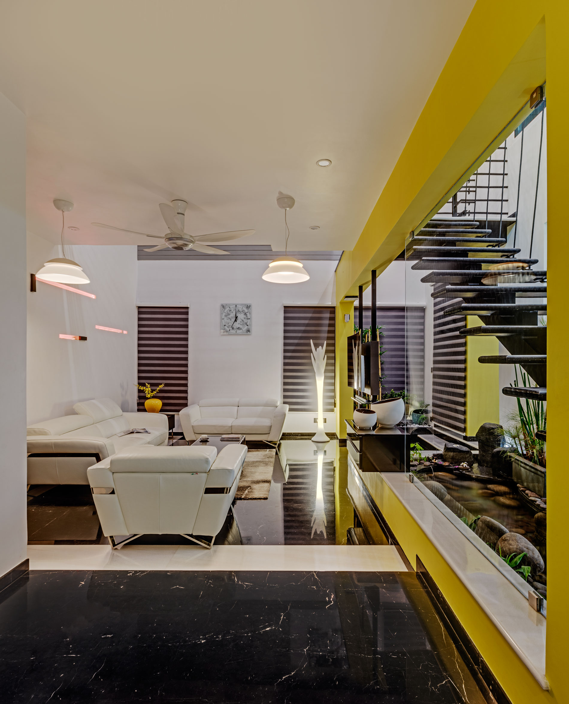 A Bright and Warm Modern Home with Lots of Yellow and White in Nagarbhavi, India by Ashwin Architects (6)
