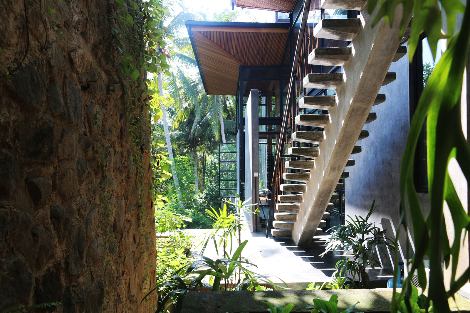 A Contemporary Home with Suspended Spiral Staircase in Bali, Indonesia by Alexis Dornier (6)