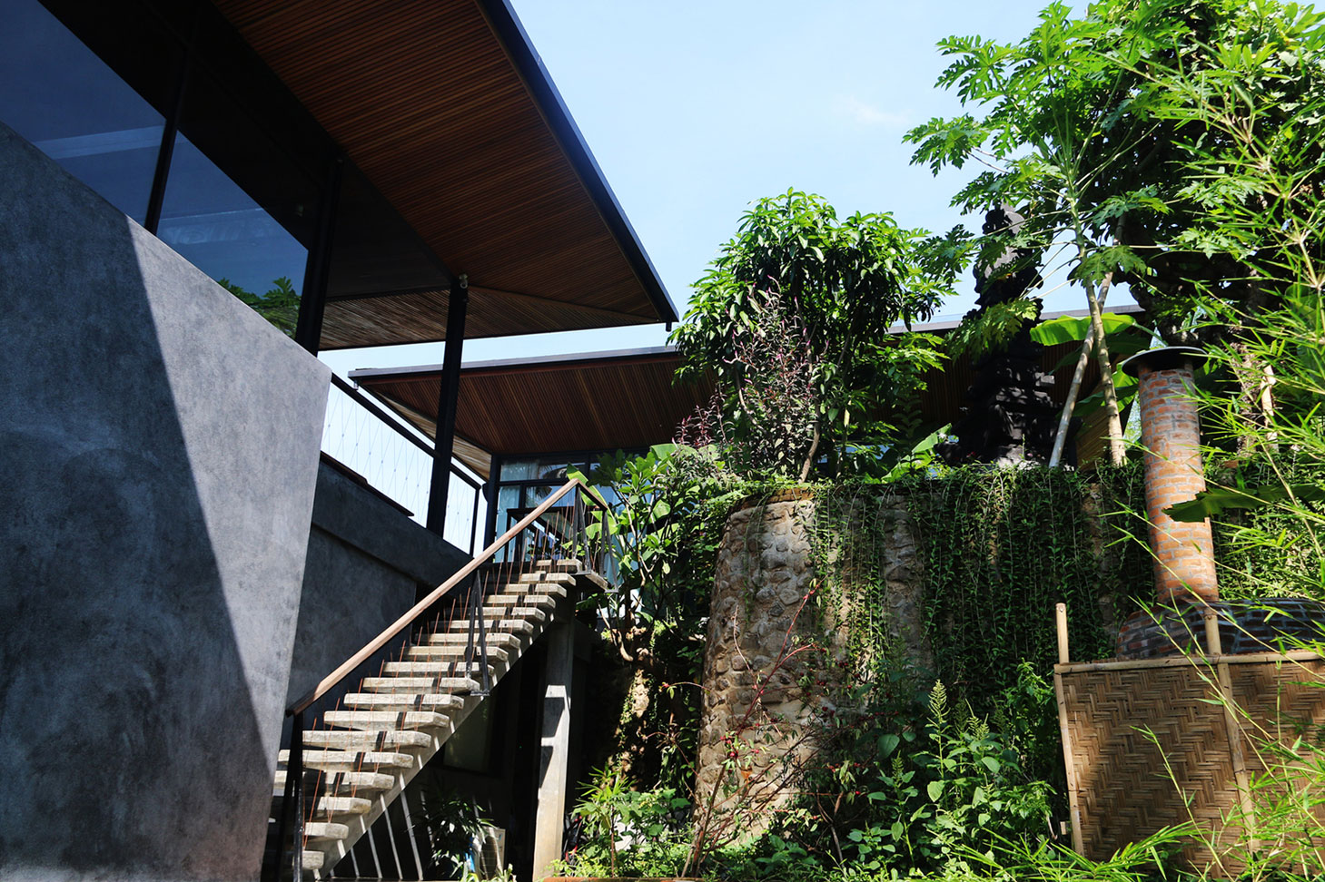 A Contemporary Home with Suspended Spiral Staircase in Bali, Indonesia by Alexis Dornier (7)