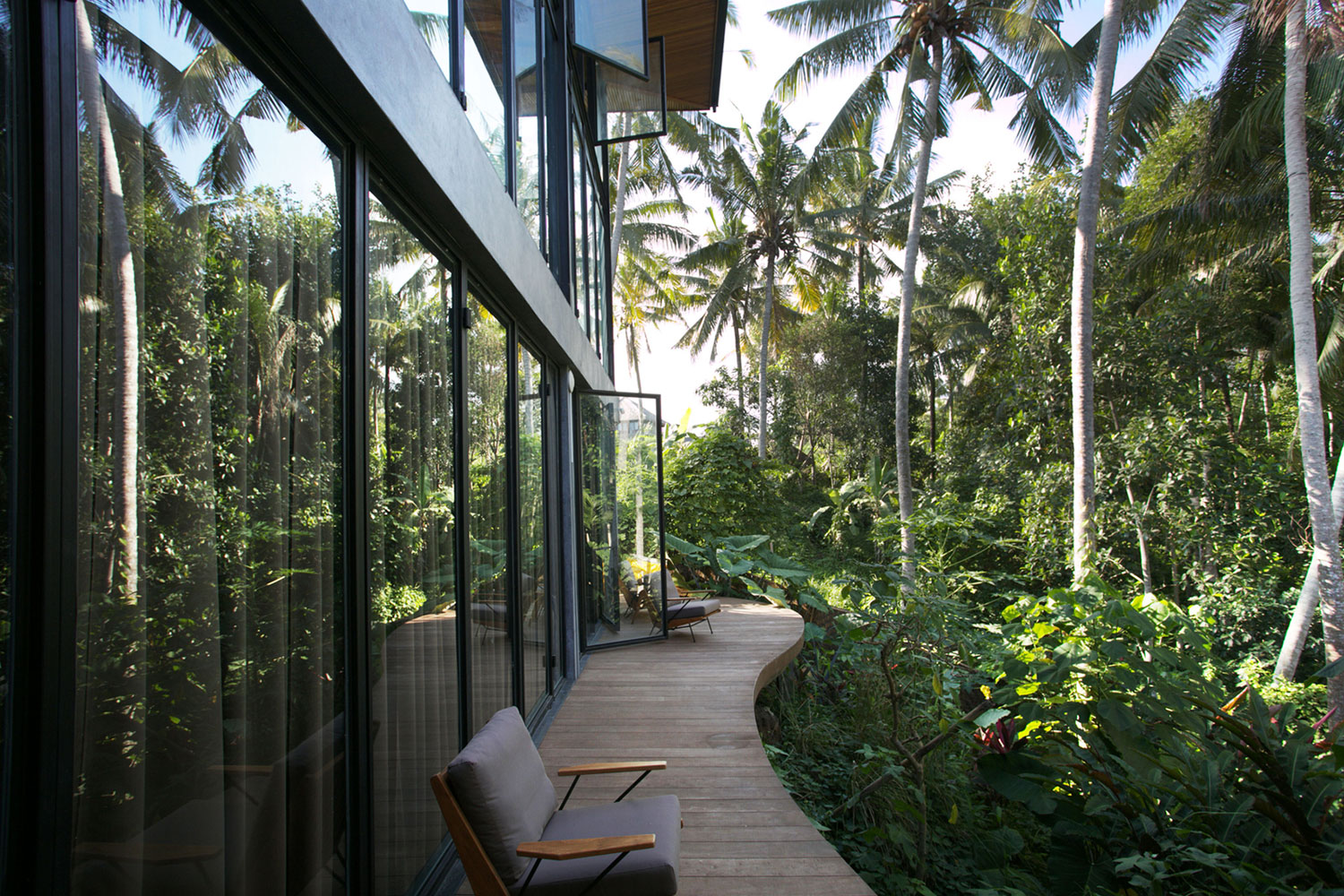 A Contemporary Home with Suspended Spiral Staircase in Bali, Indonesia by Alexis Dornier (9)