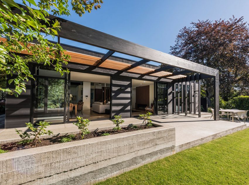 A Modern L-Shaped House with Light and Open Interiors in Fendalton, New Zealand by Cymon Allfrey Architects Ltd (1)