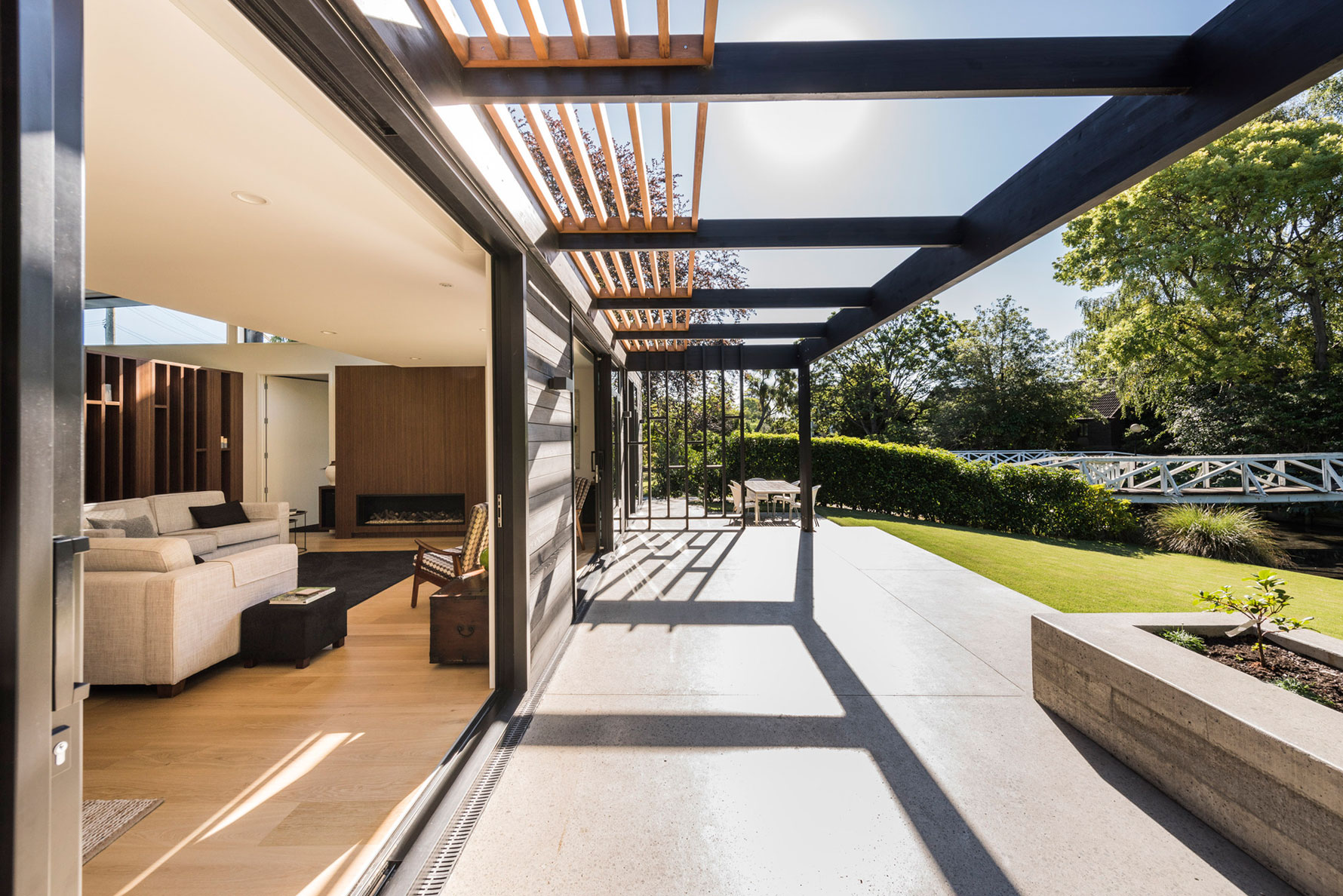 A Modern L-Shaped House with Light and Open Interiors in Fendalton, New Zealand by Cymon Allfrey Architects Ltd (3)