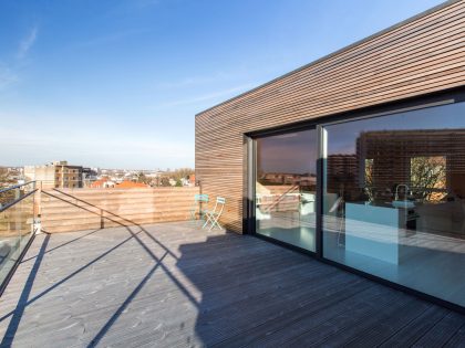 A Playful and Modern Wooden Home Packed with Elegant Interiors in Brussels, Belgium by SPOTLESS ARCHITECTURE (1)