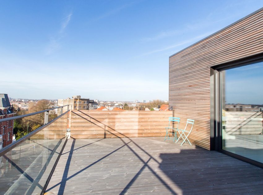 A Playful and Modern Wooden Home Packed with Elegant Interiors in Brussels, Belgium by SPOTLESS ARCHITECTURE (2)