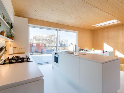 A Playful and Modern Wooden Home Packed with Elegant Interiors in Brussels, Belgium by SPOTLESS ARCHITECTURE (25)