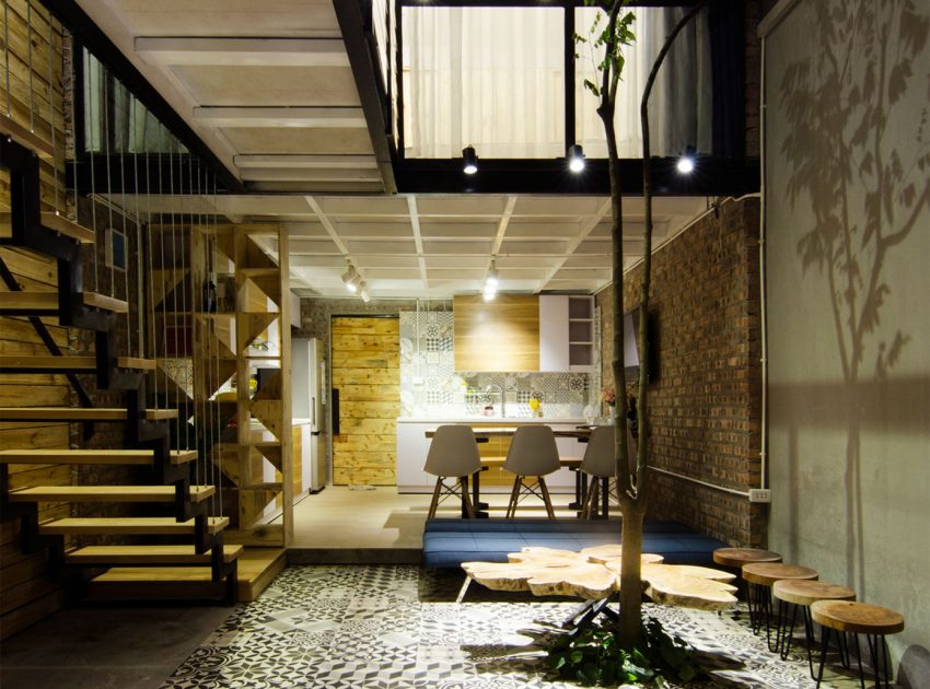 A Small Modern Home with Central Atrium and Rustic Vibe in Hoàng Văn Thái by Global Architects & Associates (1)