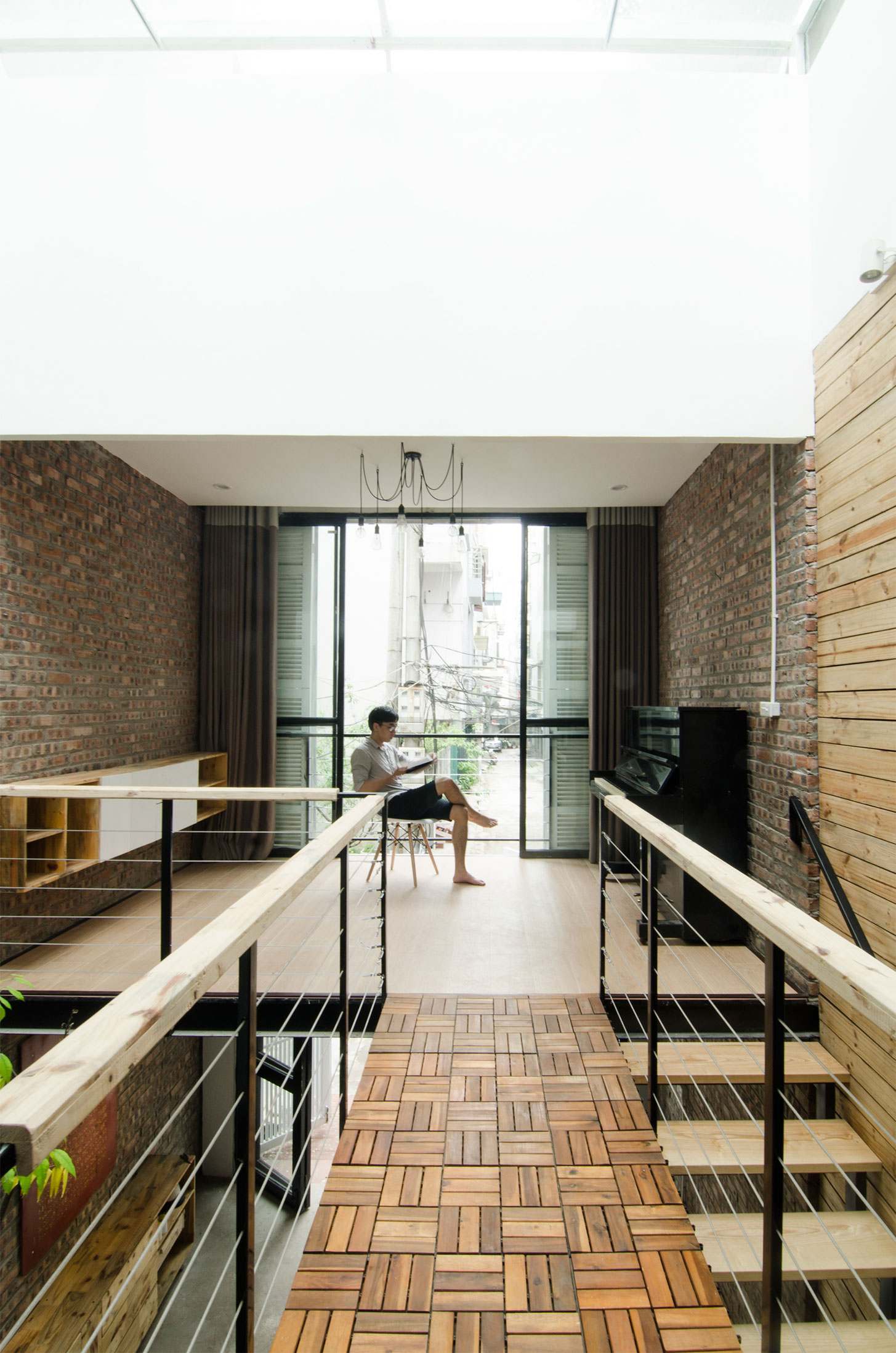 A Small Modern Home with Central Atrium and Rustic Vibe in Hoàng Văn Thái by Global Architects & Associates (10)