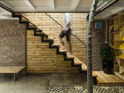 A Small Modern Home with Central Atrium and Rustic Vibe in Hoàng Văn Thái by Global Architects & Associates (6)
