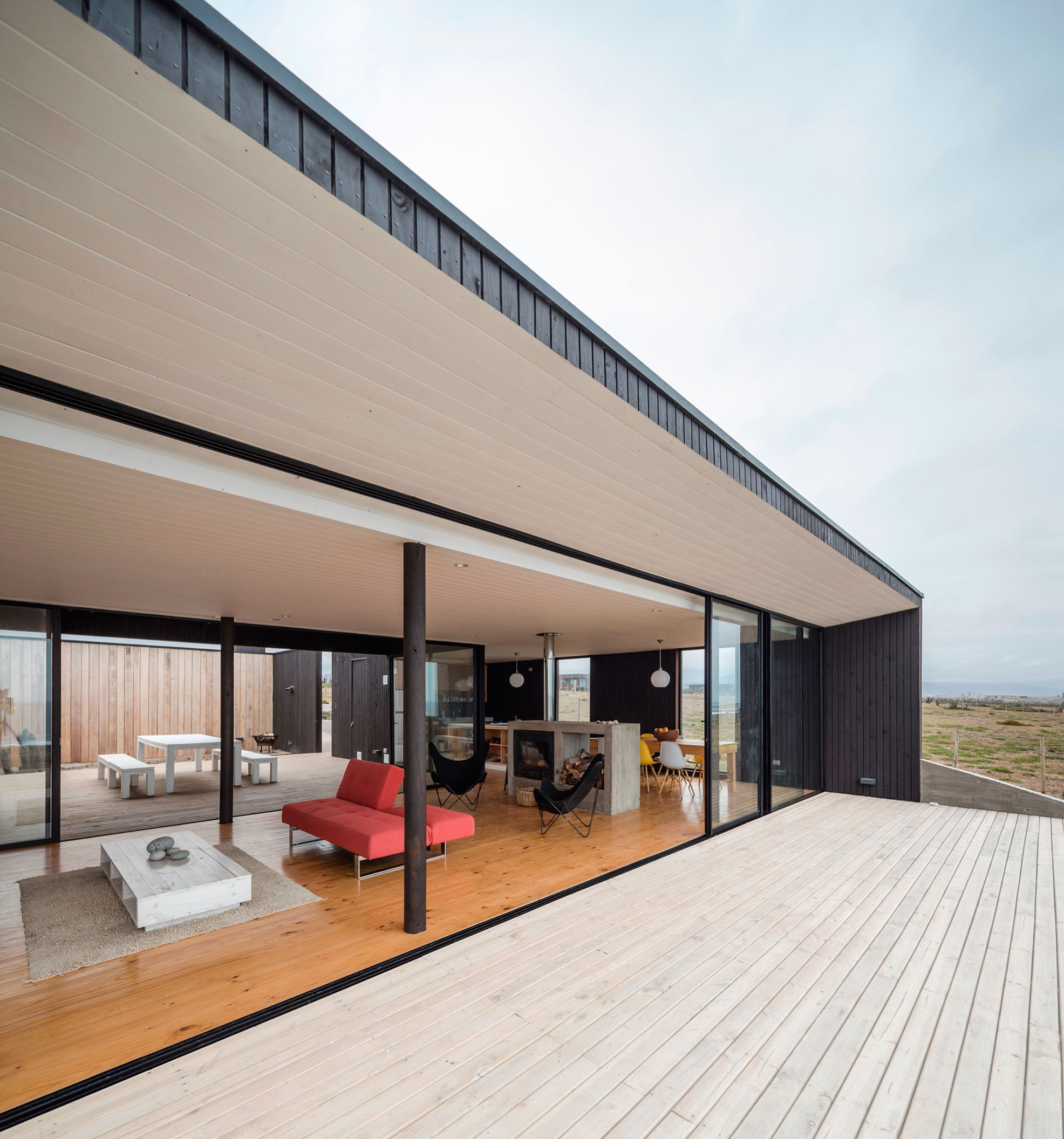 A Spacious Family-Friendly Home with Wood and Concrete Facade in Huentaleuquen, Chile by nüform (10)