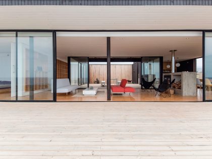 A Spacious Family-Friendly Home with Wood and Concrete Facade in Huentaleuquen, Chile by nüform (11)