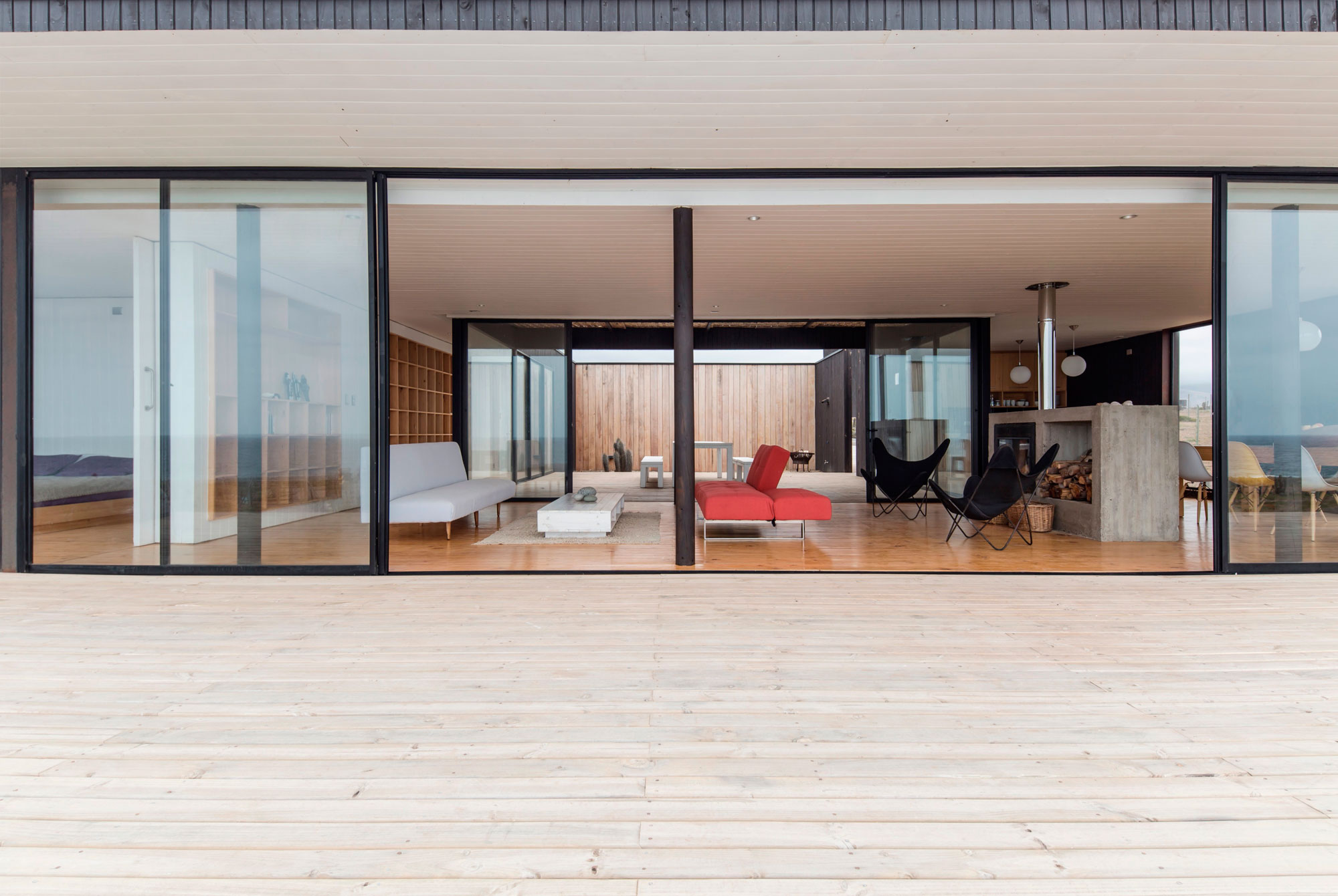 A Spacious Family-Friendly Home with Wood and Concrete Facade in Huentaleuquen, Chile by nüform (11)