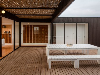 A Spacious Family-Friendly Home with Wood and Concrete Facade in Huentaleuquen, Chile by nüform (13)