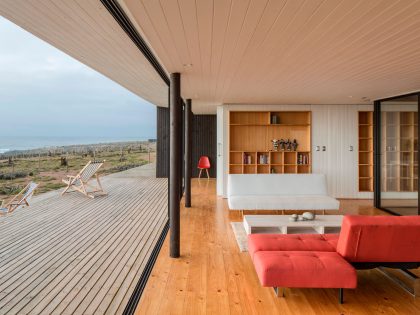 A Spacious Family-Friendly Home with Wood and Concrete Facade in Huentaleuquen, Chile by nüform (14)