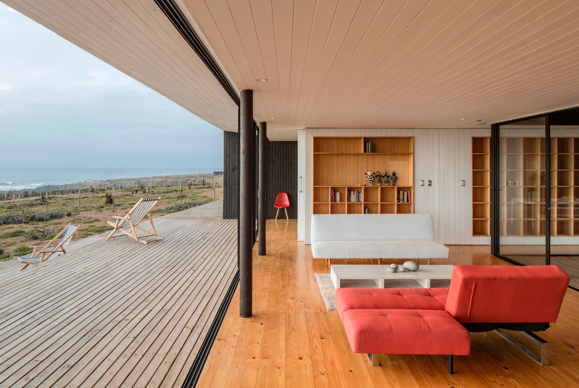 A Spacious Family-Friendly Home with Wood and Concrete Facade in Huentaleuquen, Chile by nüform (14)