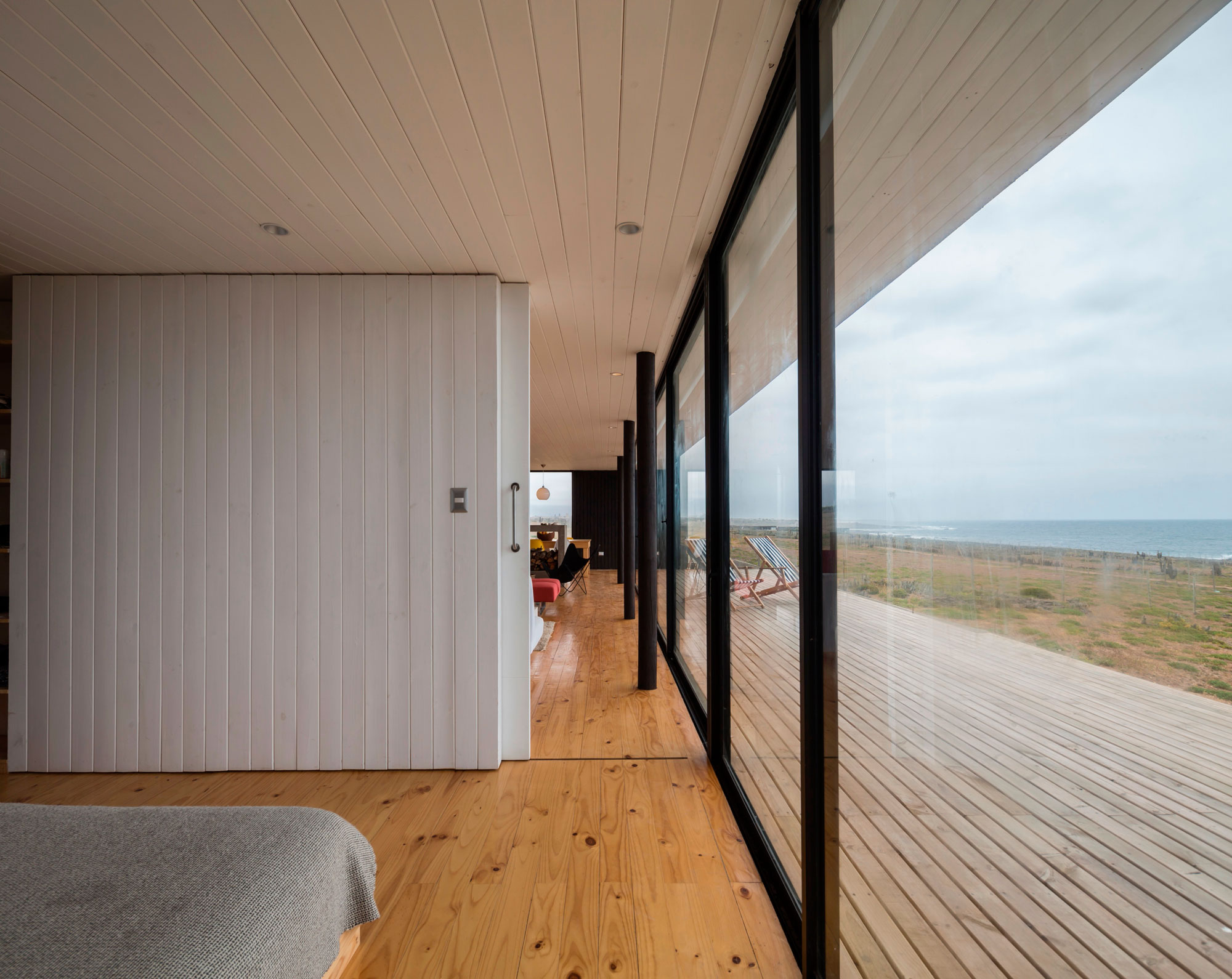 A Spacious Family-Friendly Home with Wood and Concrete Facade in Huentaleuquen, Chile by nüform (15)