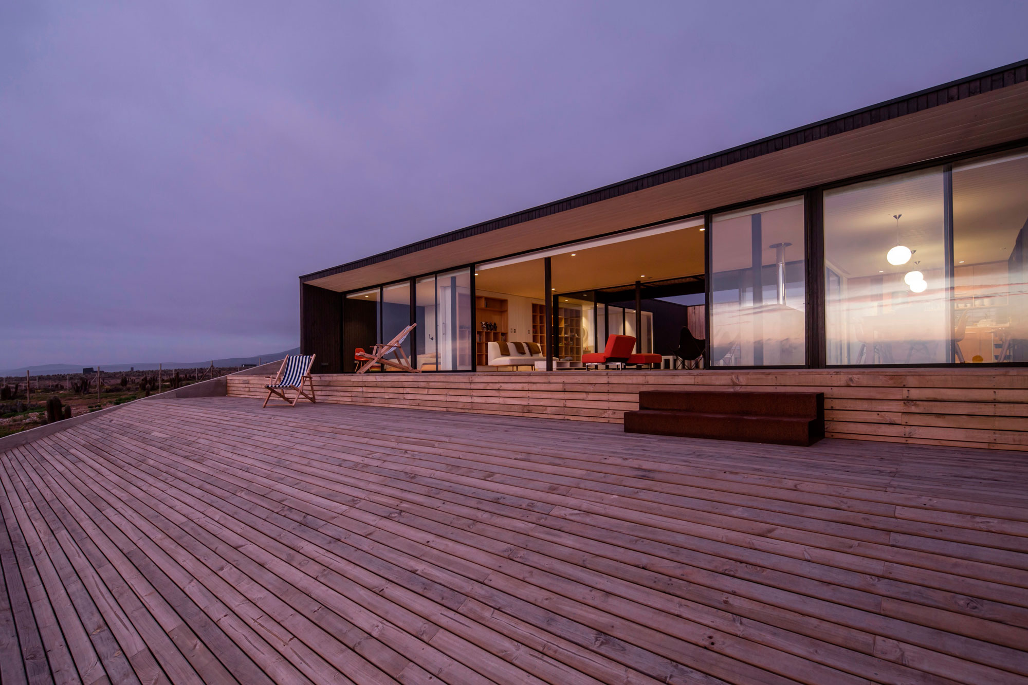 A Spacious Family-Friendly Home with Wood and Concrete Facade in Huentaleuquen, Chile by nüform (16)