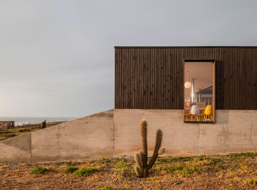 A Spacious Family-Friendly Home with Wood and Concrete Facade in Huentaleuquen, Chile by nüform (17)