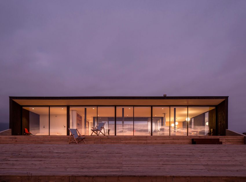 A Spacious Family-Friendly Home with Wood and Concrete Facade in Huentaleuquen, Chile by nüform (18)