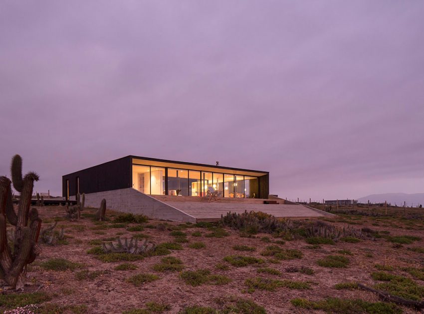 A Spacious Family-Friendly Home with Wood and Concrete Facade in Huentaleuquen, Chile by nüform (19)