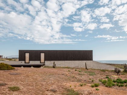 A Spacious Family-Friendly Home with Wood and Concrete Facade in Huentaleuquen, Chile by nüform (2)