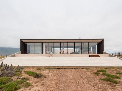 A Spacious Family-Friendly Home with Wood and Concrete Facade in Huentaleuquen, Chile by nüform (5)