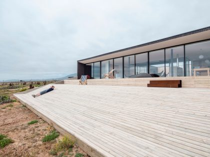 A Spacious Family-Friendly Home with Wood and Concrete Facade in Huentaleuquen, Chile by nüform (7)