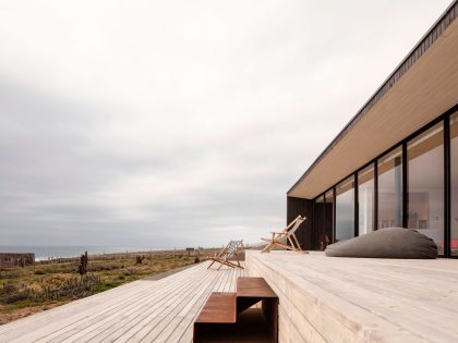 A Spacious Family-Friendly Home with Wood and Concrete Facade in Huentaleuquen, Chile by nüform (8)