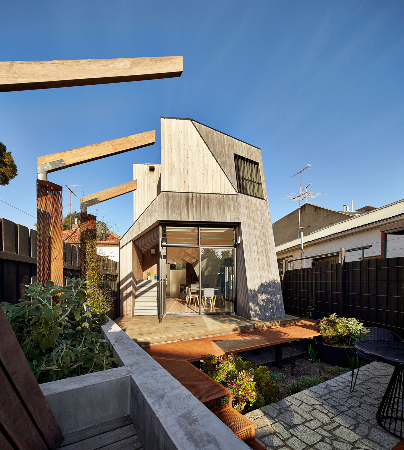 A Striking Contemporary Home with Unique and Warm Atmosphere in Carlton North, Australia by Andrew Simpson Architects (4)