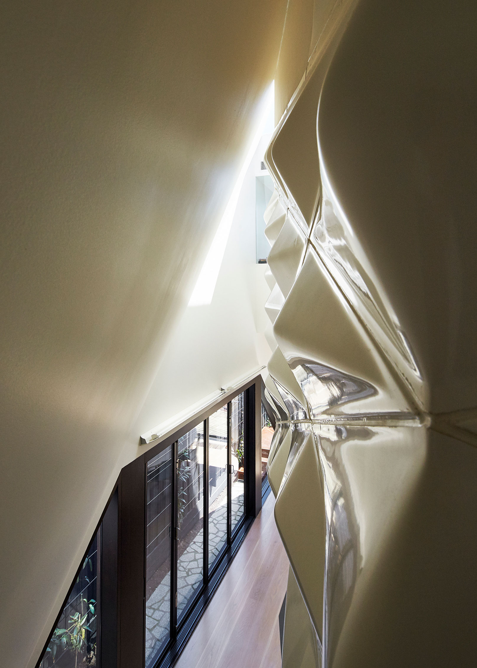 A Striking Contemporary Home with Unique and Warm Atmosphere in Carlton North, Australia by Andrew Simpson Architects (8)