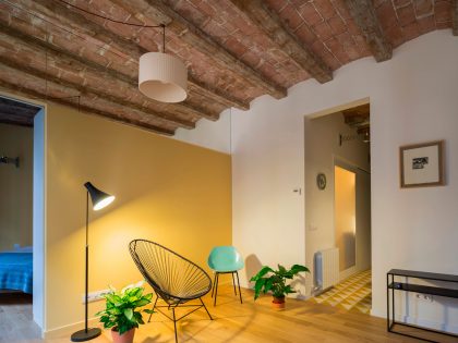 A Striking and Warm Apartment Drenched in Natural Light and Character in Barcelona, Spain