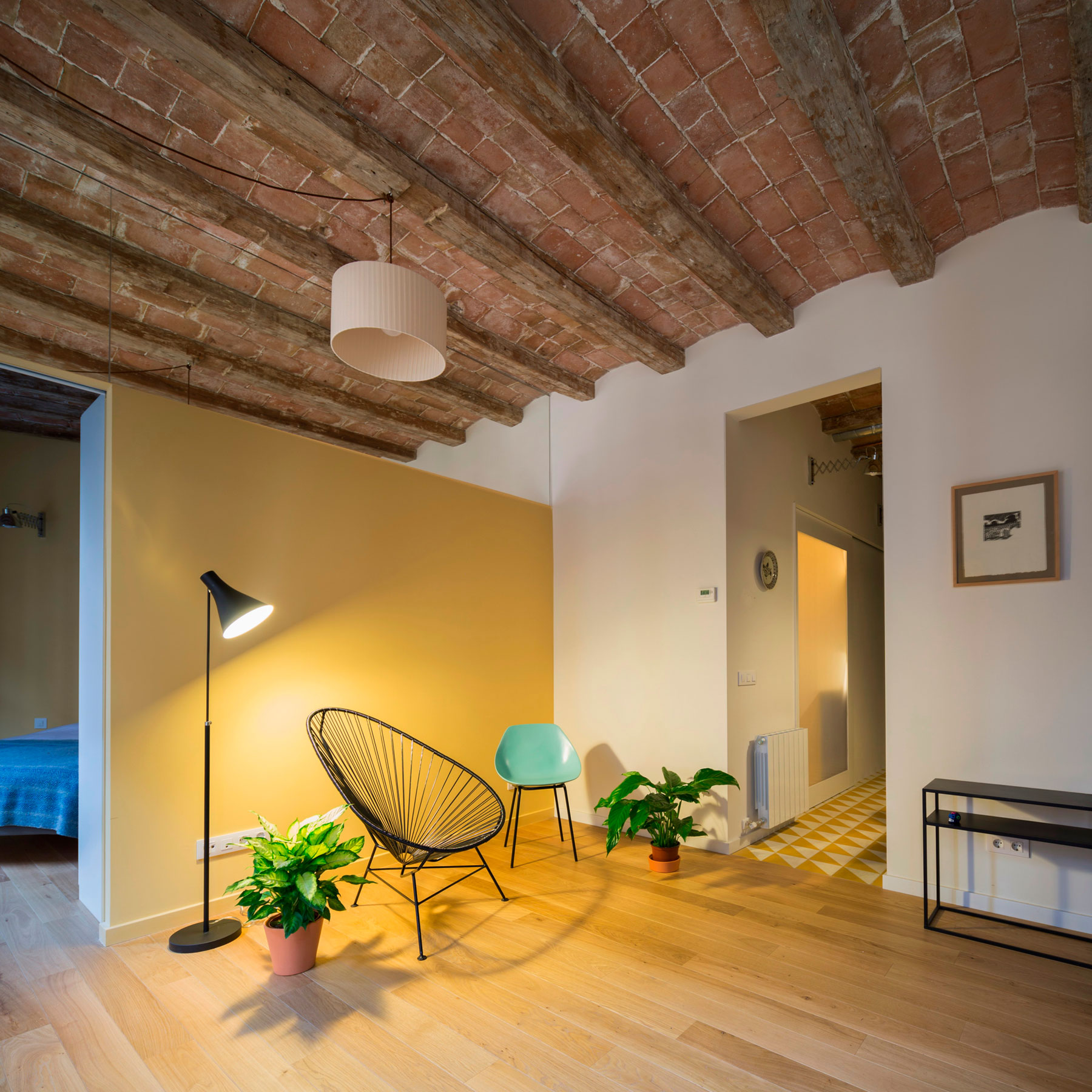 A Striking and Warm Apartment Drenched in Natural Light and Character in Barcelona, Spain by Nook Architects (1)