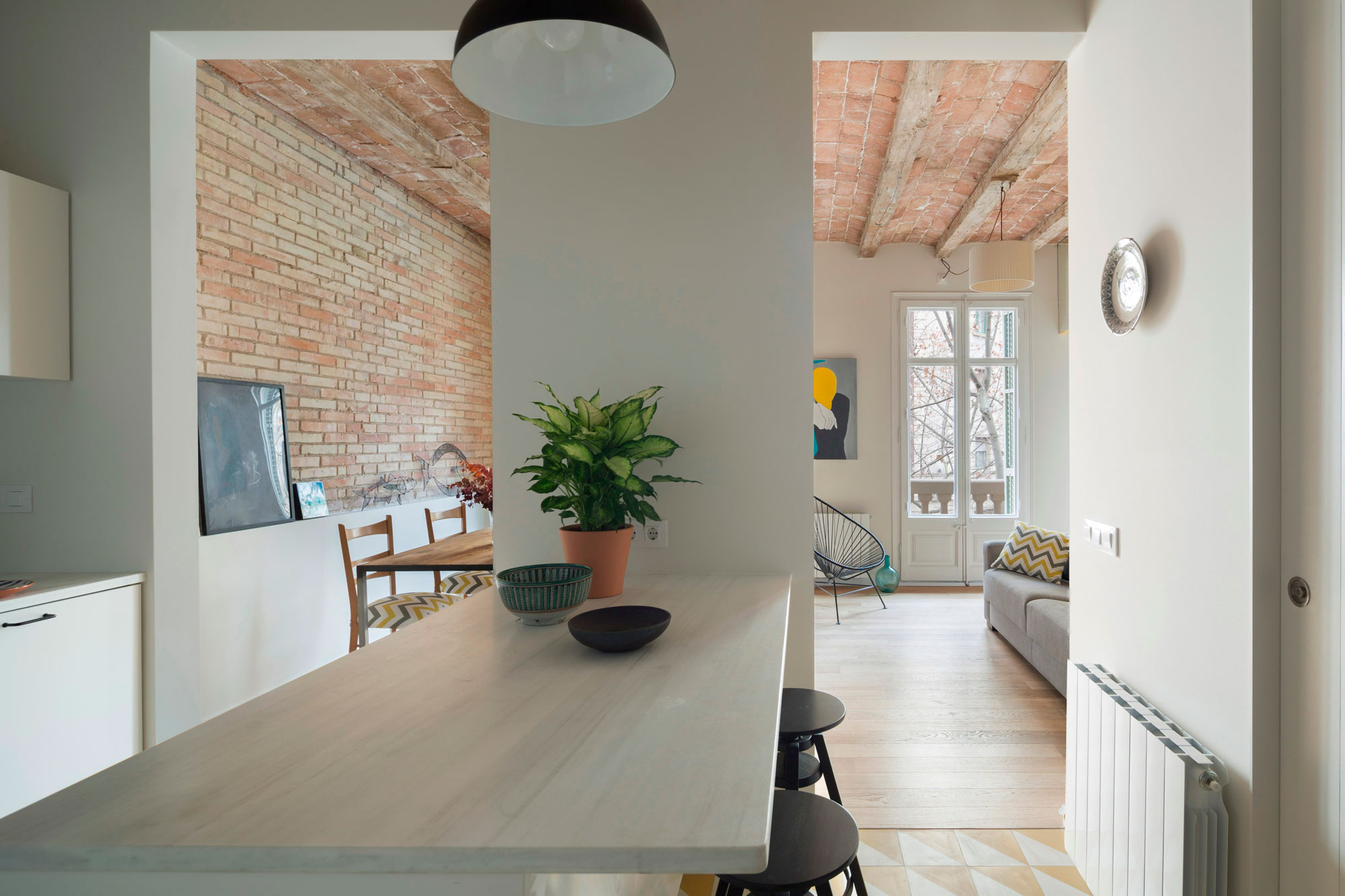 A Striking and Warm Apartment Drenched in Natural Light and Character in Barcelona, Spain by Nook Architects (10)