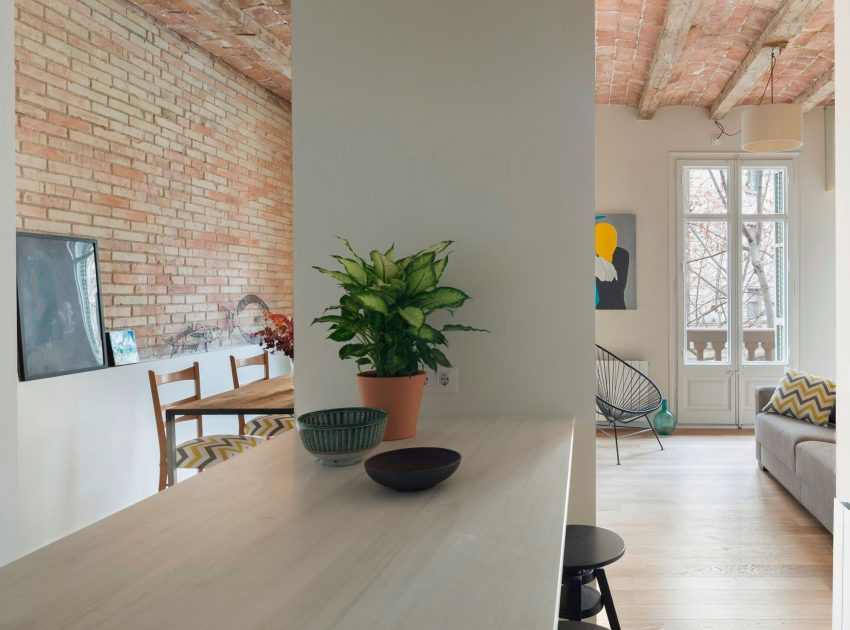 A Striking and Warm Apartment Drenched in Natural Light and Character in Barcelona, Spain by Nook Architects (11)