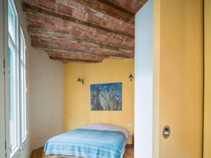 A Striking and Warm Apartment Drenched in Natural Light and Character in Barcelona, Spain by Nook Architects (15)