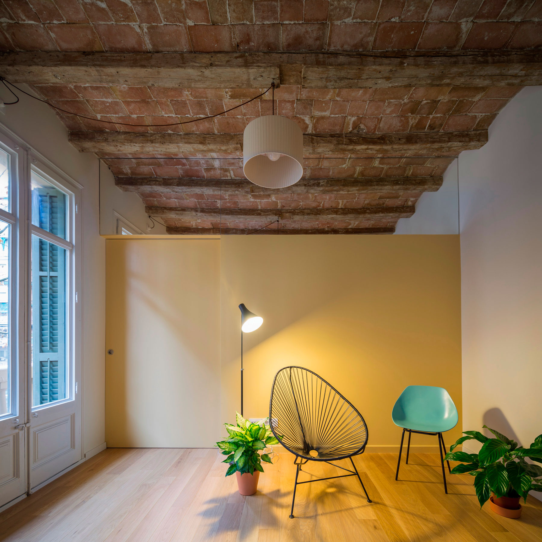A Striking and Warm Apartment Drenched in Natural Light and Character in Barcelona, Spain by Nook Architects (2)