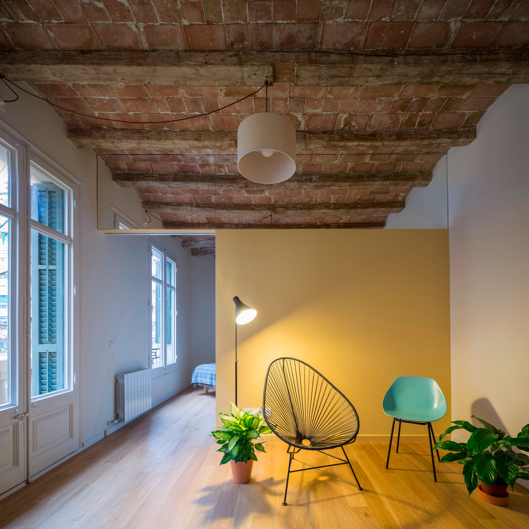 A Striking and Warm Apartment Drenched in Natural Light and Character in Barcelona, Spain by Nook Architects (3)