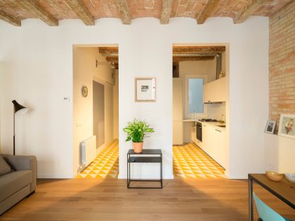 A Striking and Warm Apartment Drenched in Natural Light and Character in Barcelona, Spain by Nook Architects (4)