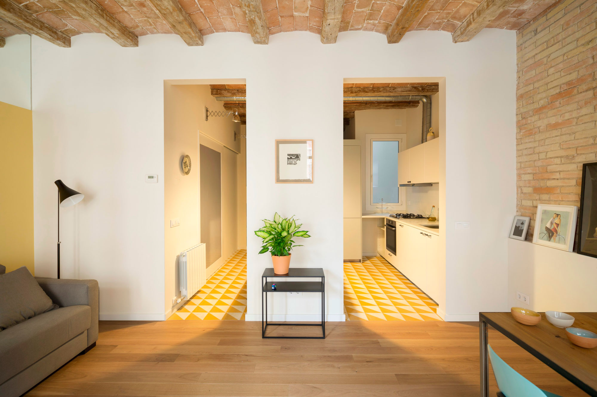 A Striking and Warm Apartment Drenched in Natural Light and Character in Barcelona, Spain by Nook Architects (4)