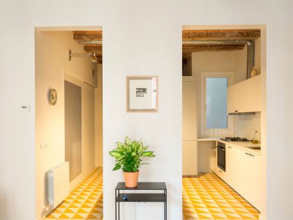 A Striking and Warm Apartment Drenched in Natural Light and Character in Barcelona, Spain by Nook Architects (5)