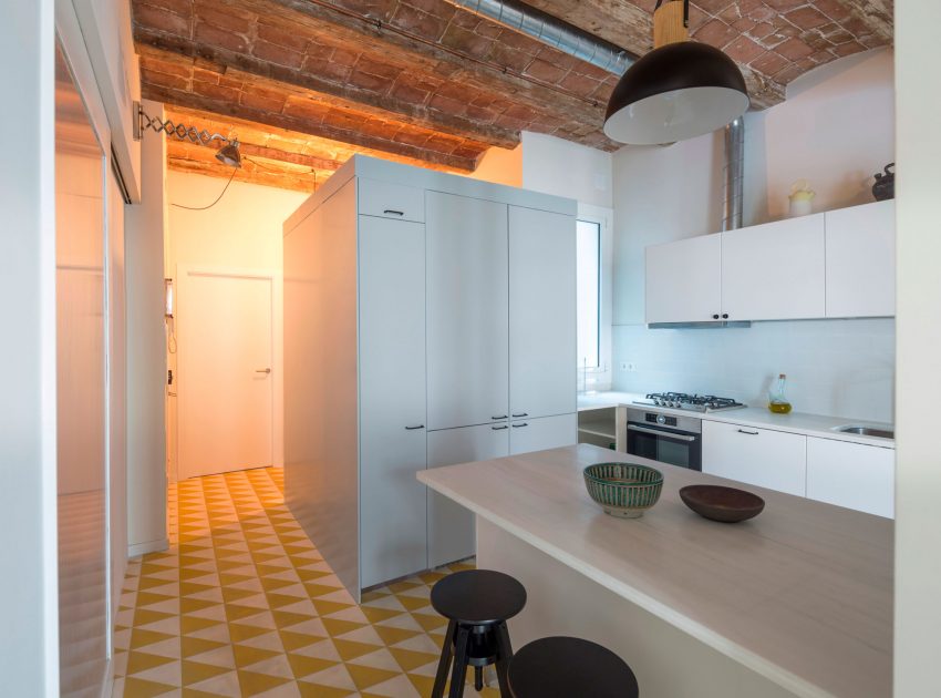 A Striking and Warm Apartment Drenched in Natural Light and Character in Barcelona, Spain by Nook Architects (6)