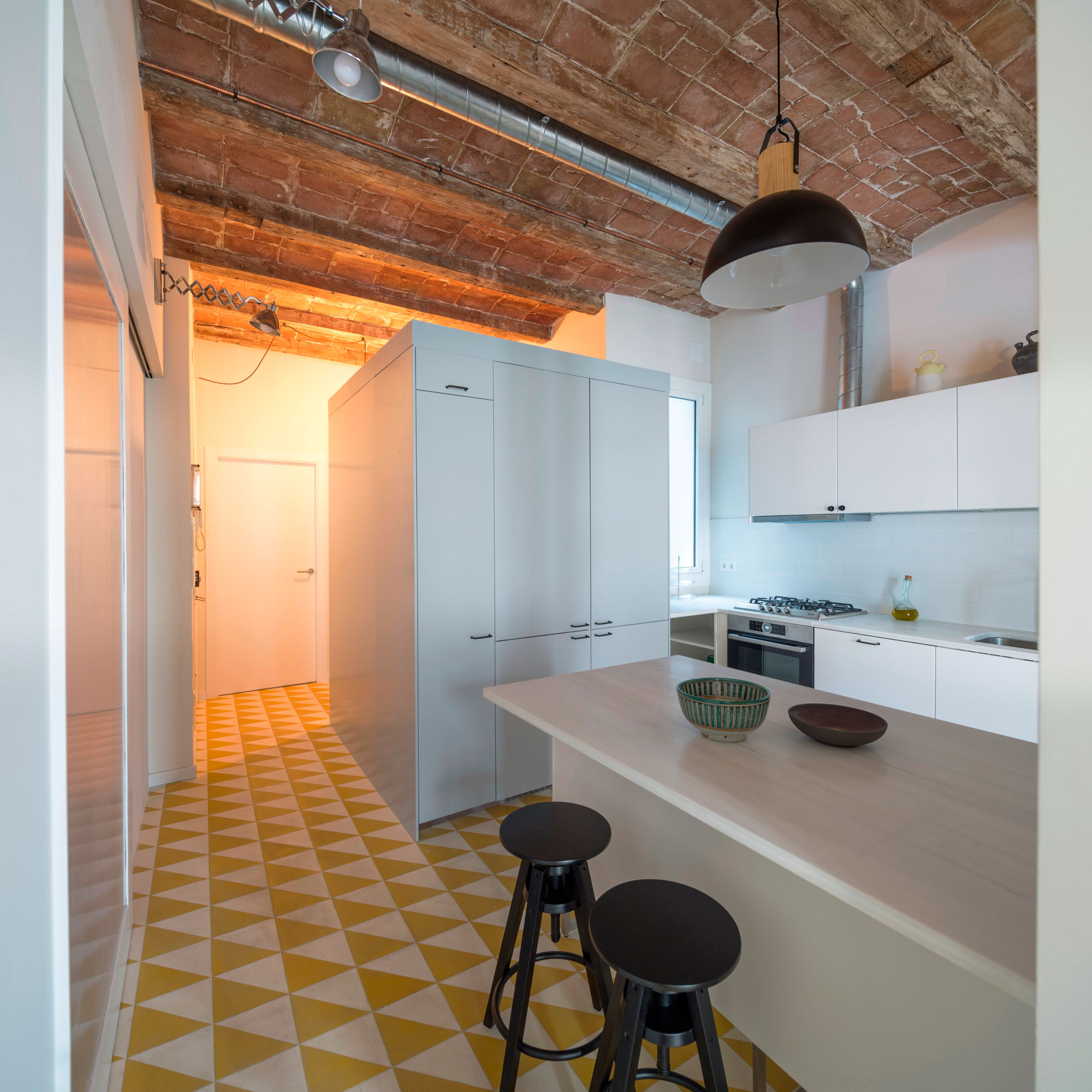 A Striking and Warm Apartment Drenched in Natural Light and Character in Barcelona, Spain by Nook Architects (6)