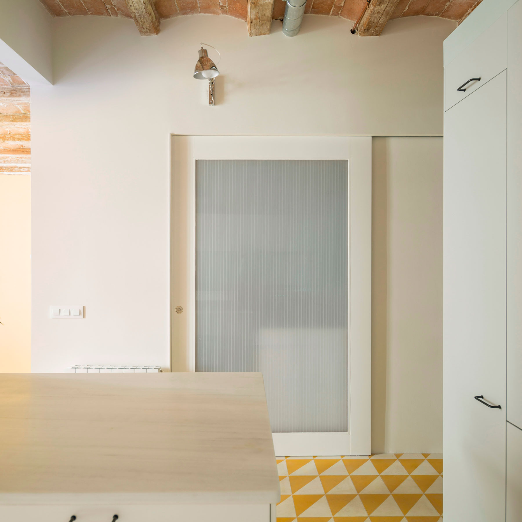 A Striking and Warm Apartment Drenched in Natural Light and Character in Barcelona, Spain by Nook Architects (7)