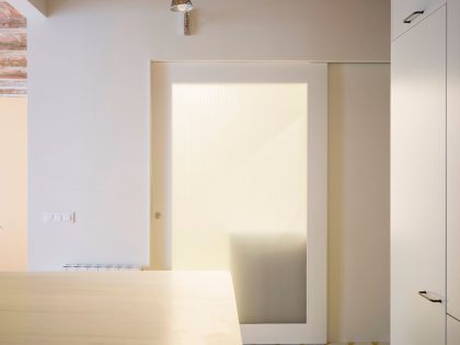 A Striking and Warm Apartment Drenched in Natural Light and Character in Barcelona, Spain by Nook Architects (8)