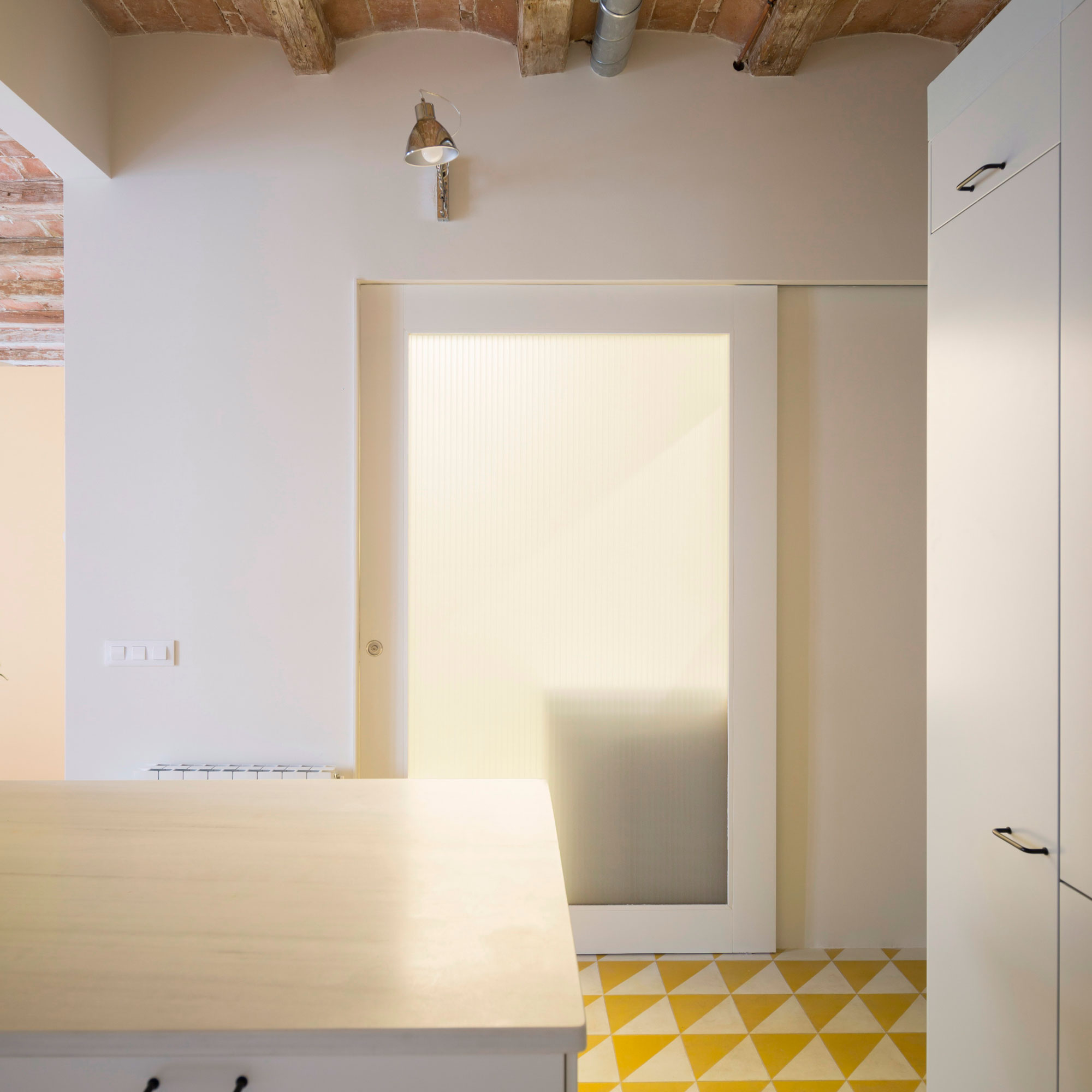 A Striking and Warm Apartment Drenched in Natural Light and Character in Barcelona, Spain by Nook Architects (8)