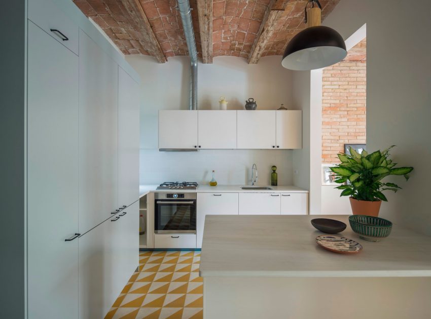 A Striking and Warm Apartment Drenched in Natural Light and Character in Barcelona, Spain by Nook Architects (9)